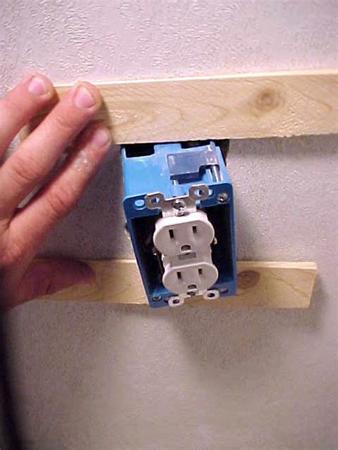 fixing a loose electrical outlet box|fixing electrical outlets.